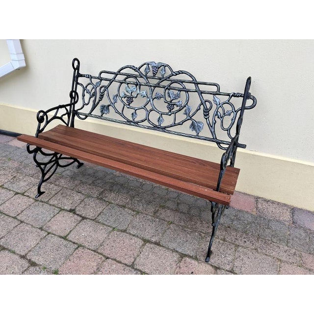 A simply stunning original antique, craftsmen made cast iron garden bench. Expertly restored and finished with the finest...