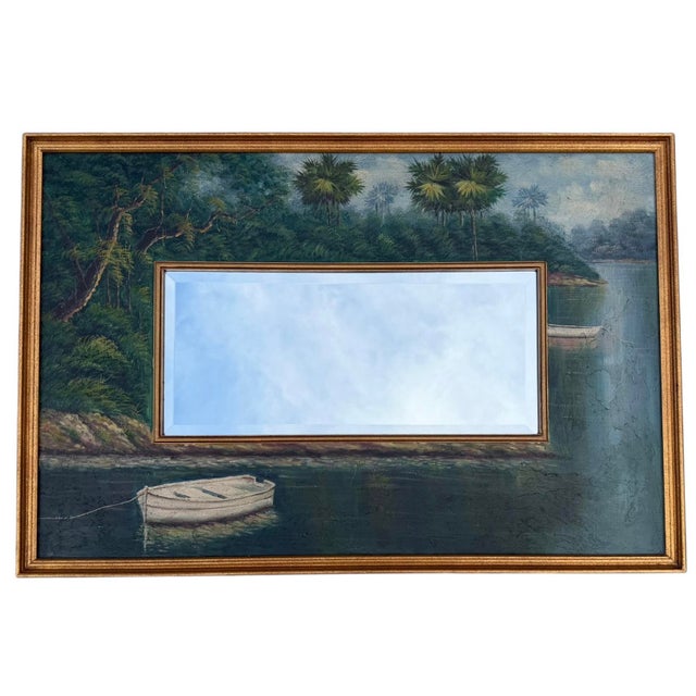 Vintage hand-painted wall mirror featuring a tropical landscape with palm trees, a tranquil shoreline, and a moored...