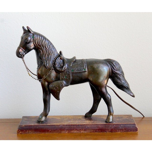Bring a touch of nostalgic Americana and western charm to your interior with this captivating vintage horse TV lamp dating...