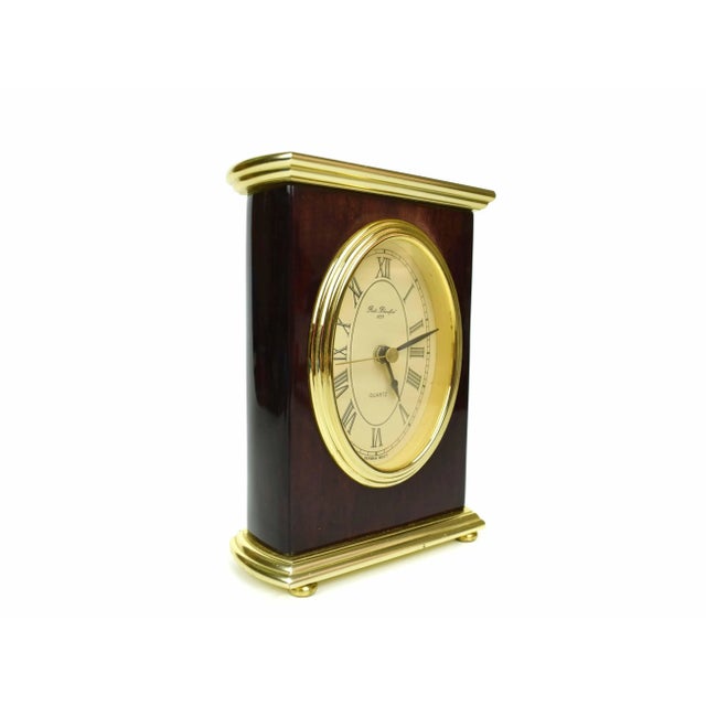 Mid 20th century gold brass and wood Robt Blandford desk table top analog clock mad in Germany. It will enhance any home...