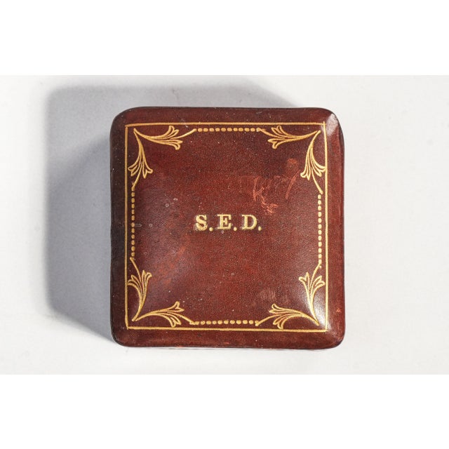 A beautifully refined treasure from the mid-century era, this charming square jewelry box captures the timeless appeal of...