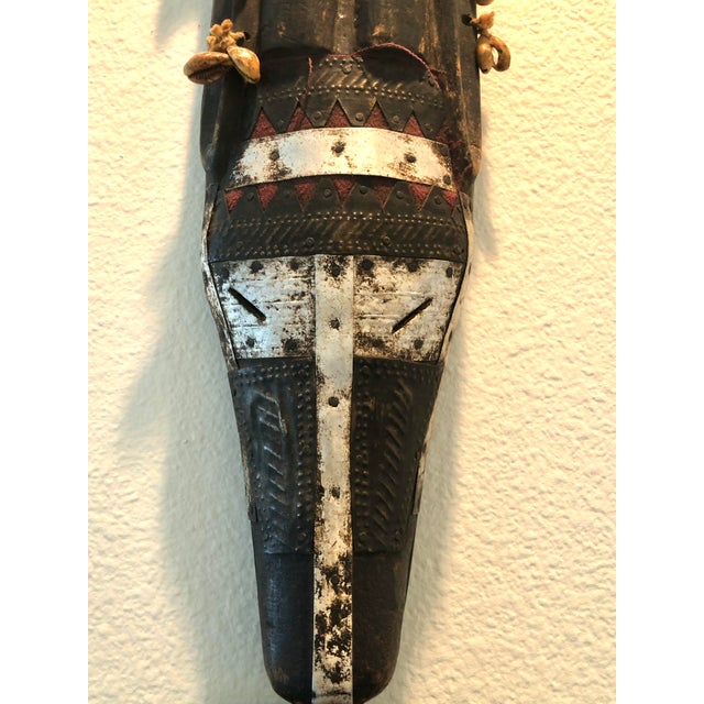 Antique African N’tomo Mask Traditional African tribal mask, specifically styled after the Ntomo (or N'tomo) masks created...