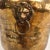 Lovely hammered brass or copper planter vase with lions head ring accents and paw feet.