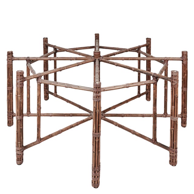 This Vintage faux bamboo dining table featuring a sculptural brown bamboo-form base with intricate wrapped detailing. A...
