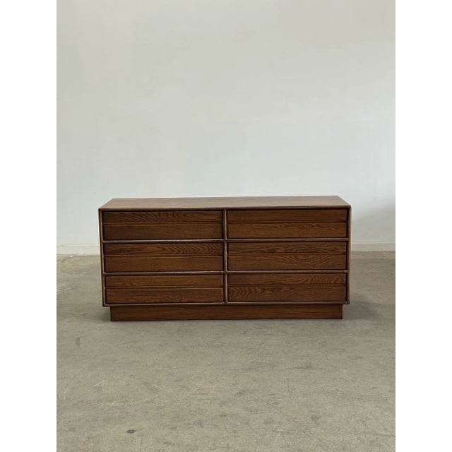 W57.5 D18 H28 Fully restored oak dresser on a plinth base. Unit shows well with no major areas of wear. Dresser has hidden...
