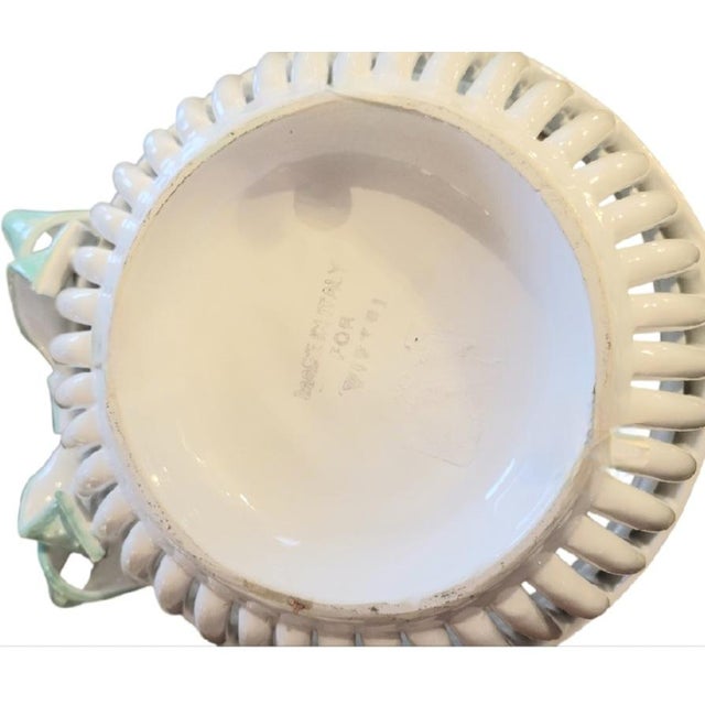 Add a delightful touch of classic motif and charm to your tabletop or entry console with this exquisite vintage glazed...