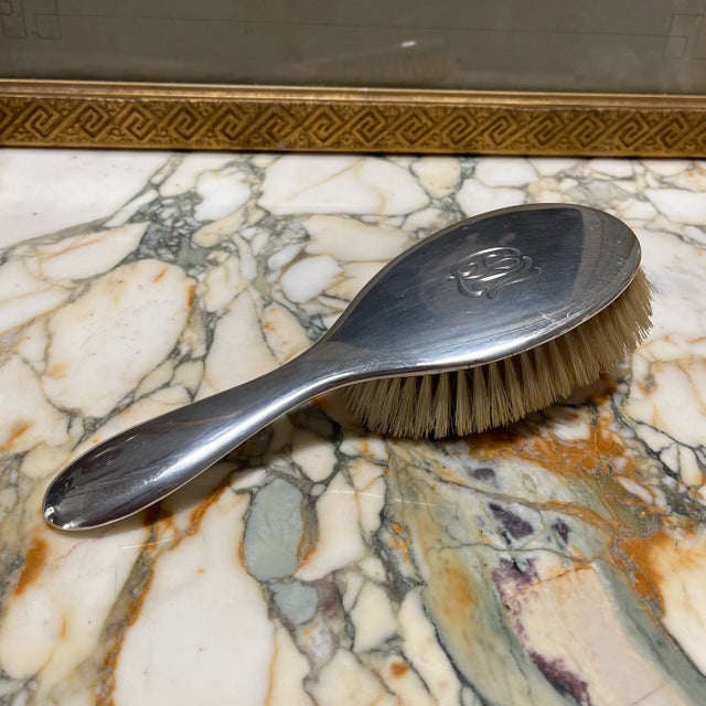 A beautiful bristle hair brush made of sterling silver. Light weight and very nice to the touch