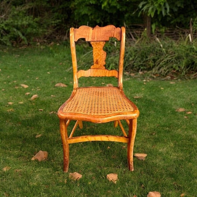 Striking antique side chair, masterfully crafted from bird’s eye and tiger maple with a gently timeworn finish that...