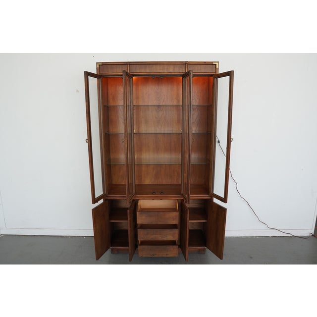 A striking illuminated china cabinet from the Accolade II collection by Drexel Heritage, crafted in the late 1970s. This...