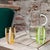 Elegant tumblers characterized by white glass paste bands applied to bright colors making them similar but always unique....
