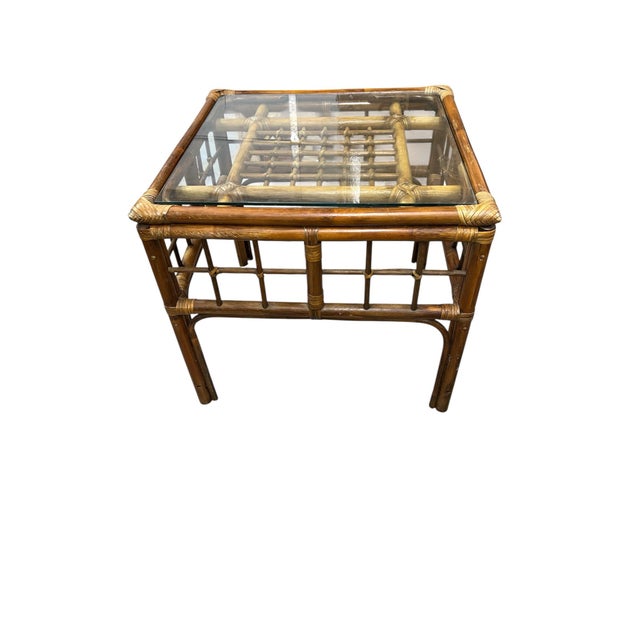 Vintage glass top bamboo side table Measures 24” square x 21” h. Normal for age and use, sun fading in the center portion...