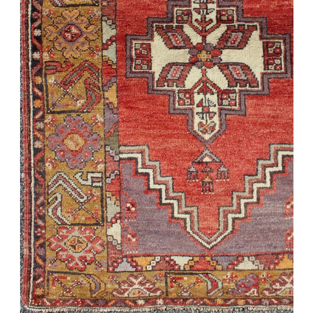 Turkish Geometric Vintage Turkish Oushak Carpet in Soft Red, Light Purple, & Gold Border For Sale - Image 3 of 7