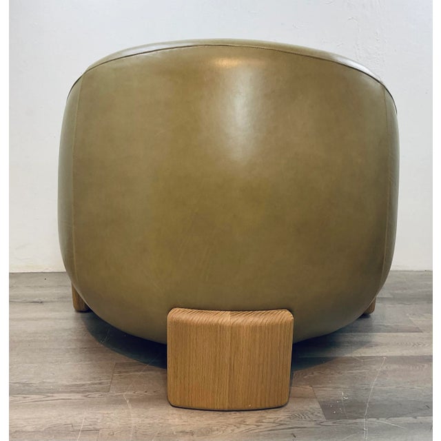 Original retail $3497, stylish Theodore Alexander Modern Light Bronze Leather Arlo Club Chair, warm oak wood legs,...