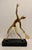 Very unique large heavy solid brass tennis sculpture or statue on grey and black marble base. Great abstract Mid Century...