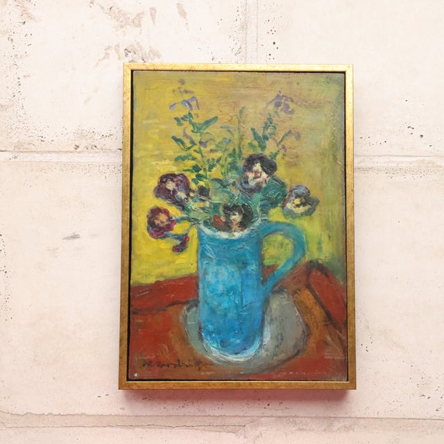 20th Century French Purple Flowers Painting by Robert Rodrigue features a vibrant still life with a blue pitcher filled...
