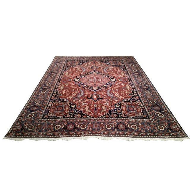 Infuse a touch of beauty to high-traffic areas of your home with this durable traditional romania rug in colors of pink,...