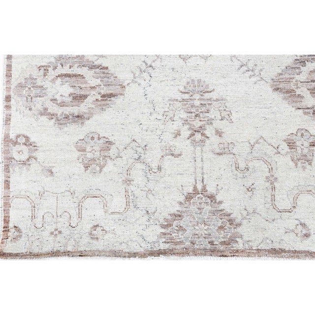 A harmonious blend of classic elegance and contemporary subtlety, this modern traditional-inspired botanical wool runner...