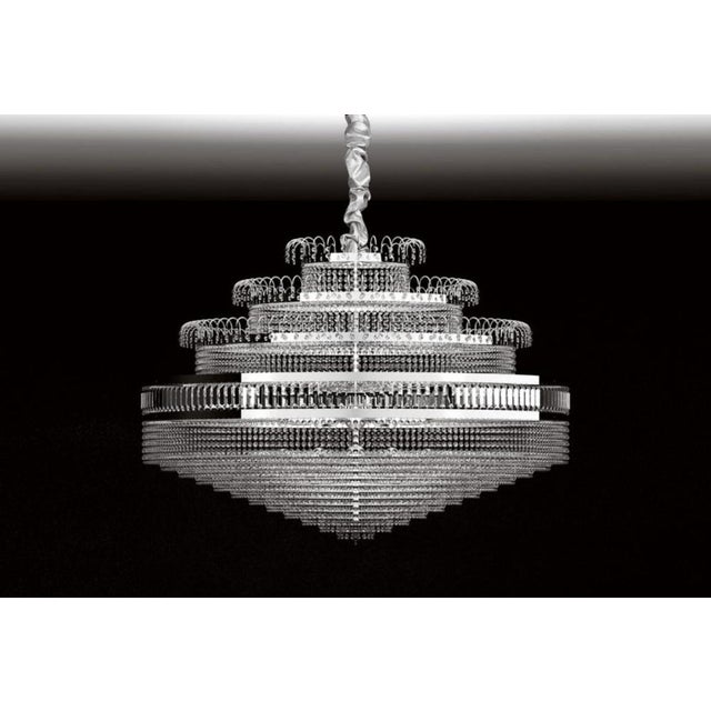 Crystalis 18 lights chandelier in polished chrome and crystal by aggiolight. Dimensions: d 120 x h 80 cm. Materials:...