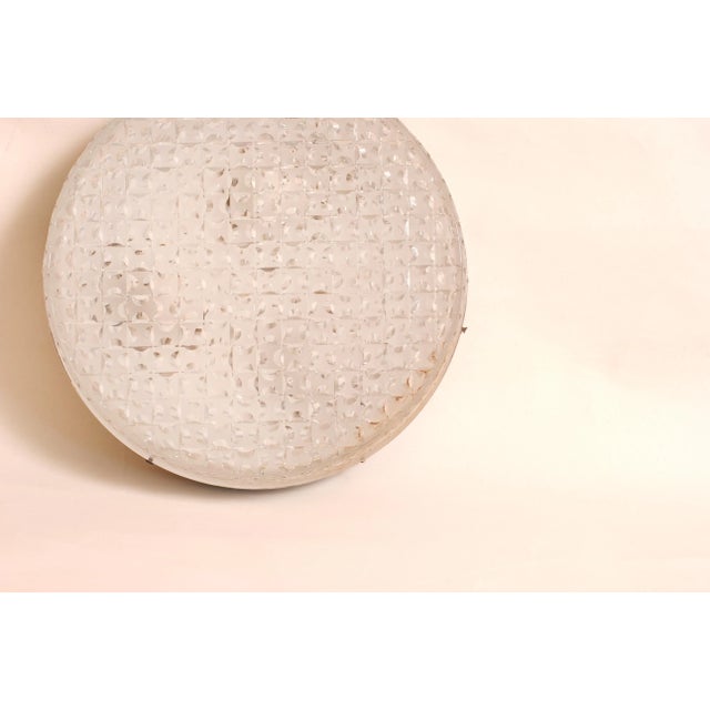 Mid-Century Modern Flush Mount with Chiseled Glass and Metal Base and Ceramic Sockets, 1950s, in Very Good conditions....