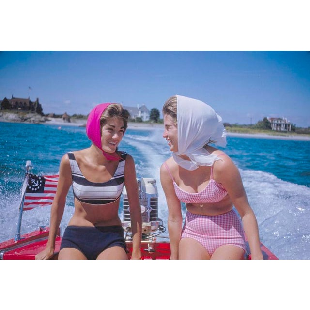 Rhode Island Smiles by Toni Frissell Two women wearing bikinis enjoy a ride in a speedboat, Newport Rhode Island, USA,...