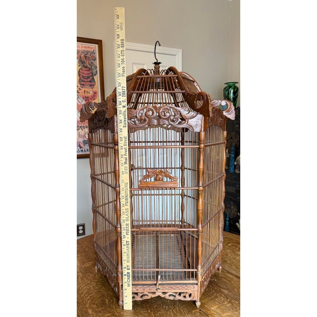 Beautiful Large Antique Wooden Ornate Pagoda Style Bird Cage From the late 19th century to the early 20th century It...