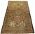 This antique hand-knotted Persian area rug features an intricate central medallion, detailed floral and vine (arabesque)...