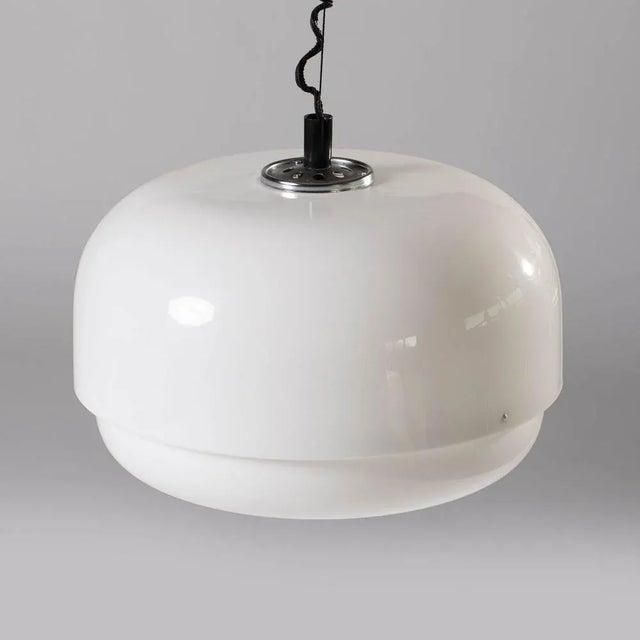 Space age adjustable pendant lamp produced by Meblo / Guzzini, italy, 1970s. Made of white / white plastic with chromed...