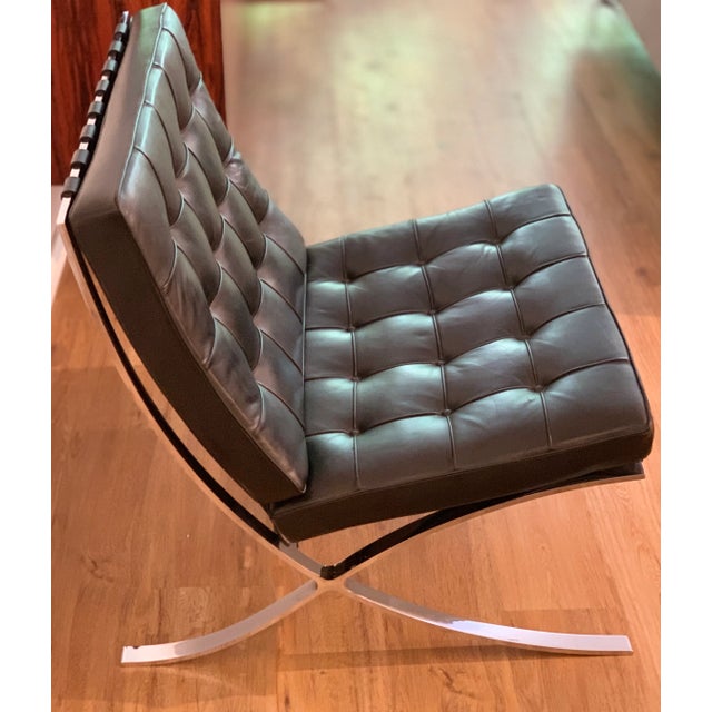Barcelona armchair was designed by Ludwig Mies van der Rohe in 1929. The chair is in great condition: - Chrome condition...