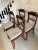 Quality set of four Regency antique mahogany dining chairs having a beautiful shaped flame mahogany top rail with a reeded...