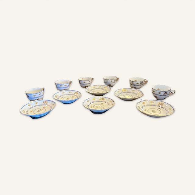 Set of 6 Herend Coronation pattern cups and saucers. White porcelain with basket weave impression and gold and blue...