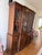 This beautiful breakfront bookcase cabinet by Hickory features banded mahogany inlay and elegant brass pulls. The top...
