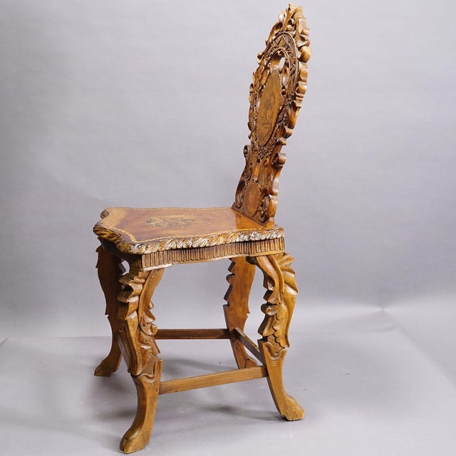 Rare Nutwood Edelweis Marquetry Chair Swiss Brienz 1900 A very nice antique Swiss nutwood chair decorated with inlayed and...