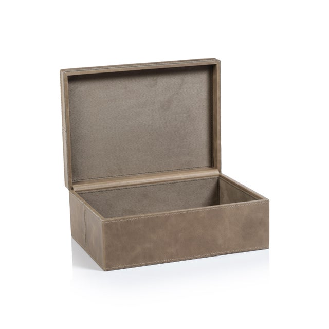 Stay organized without sacrificing beauty or quality. The handsome leather exterior of our keepsake box looks great on a...