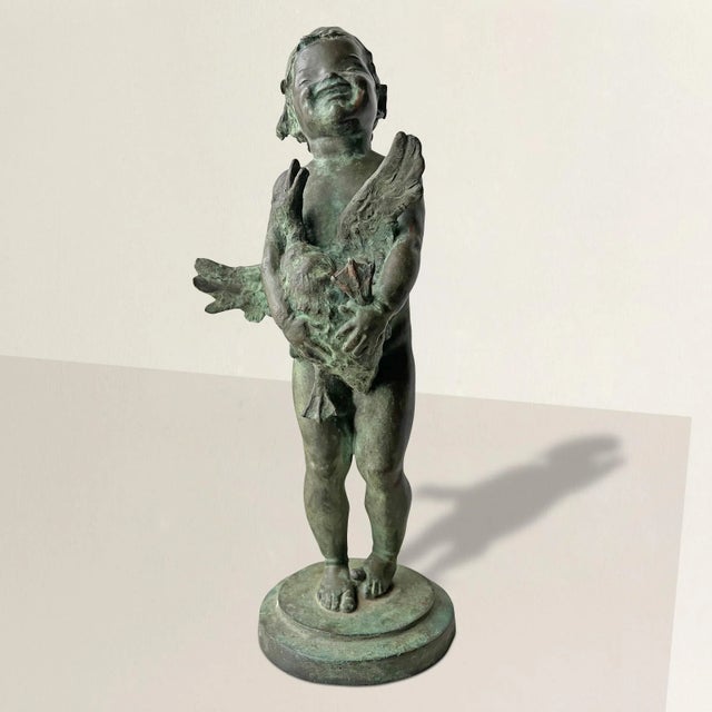 'The Big Duck,' a captivating bronze sculpture by Edith Barretto Parsons, is a masterpiece of artistry and emotion....