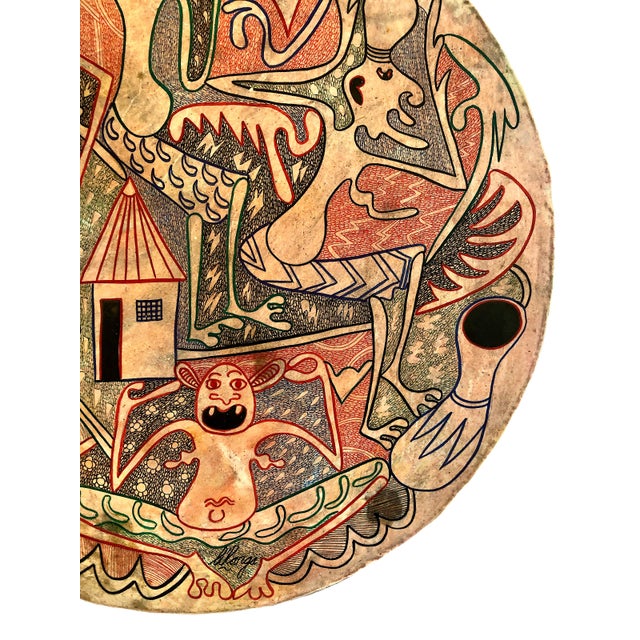 Tanzanian Spirits on a Painted and Carved Circular Wood Relief, Signed by George Lilanga For Sale In San Francisco - Image 6 of 9