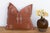 A vertical diamond column and star-marked corners give this handcrafted Moroccan cactus silk pillow quiet rhythm, hand-...