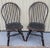 Early 20Thc Original black painted bow back Child's Windsor chairs in fine condition. These fun Children's Windsor chairs...
