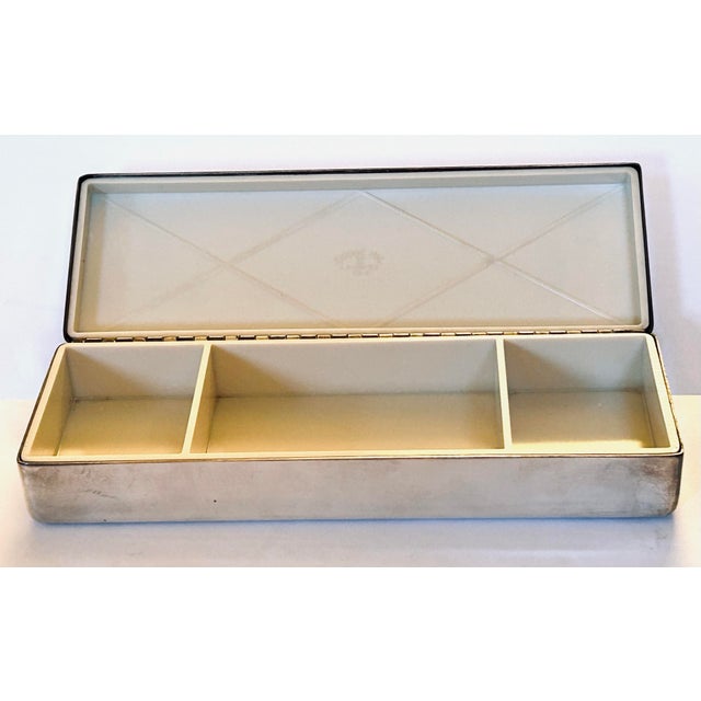 Beautiful silver plate box lined with bakelite fashioned by Dodge Inc. is a perfect place to keep your precious jewelry or...