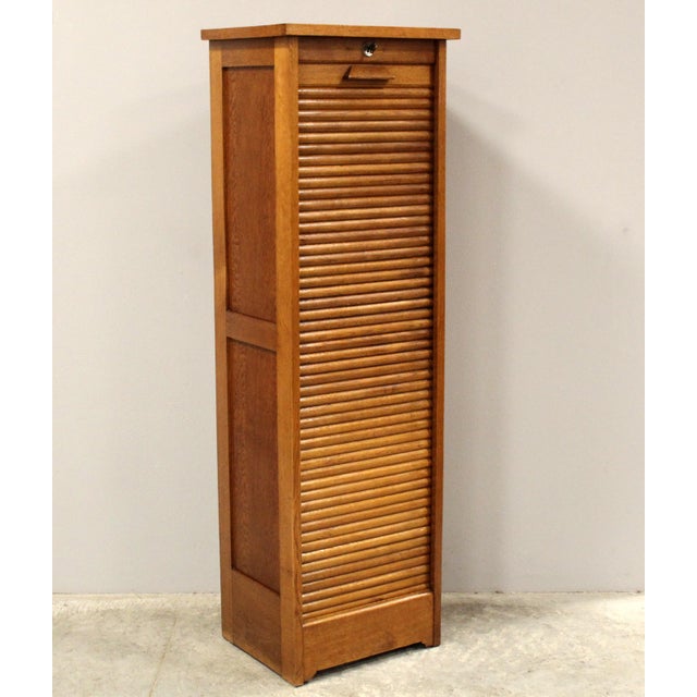 Single-shutter filing cabinet Made of oak Early 1900s Dimensions: width 45 cm, depth 37 cm, height 143 cm Restored (see...