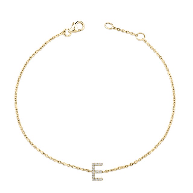 Immerse yourself in the understated elegance of this 10K yellow gold bracelet, for an enrapturing shimmer that captures...