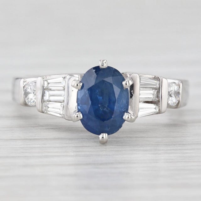 Gemstone Information: - Natural Sapphire - Carats - 1.35ct Cut - Oval Color - Dark Blue Treatment - Heated - Natural...