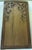 An intricately chiseled Balinese architectural wood relief carving depicting a multi-figure narrative scene alongside...