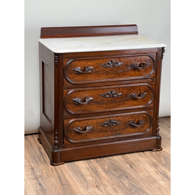 This stunning Antique Victorian Walnut Three Drawer Bachelor’s Chest, crafted around 1880, embodies the elegance and...
