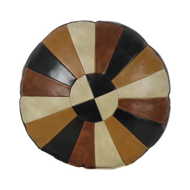 A cool, vintage, double-sided, polychrome patchwork cushion featuring a star pattern on one side and a sunburst pattern on...