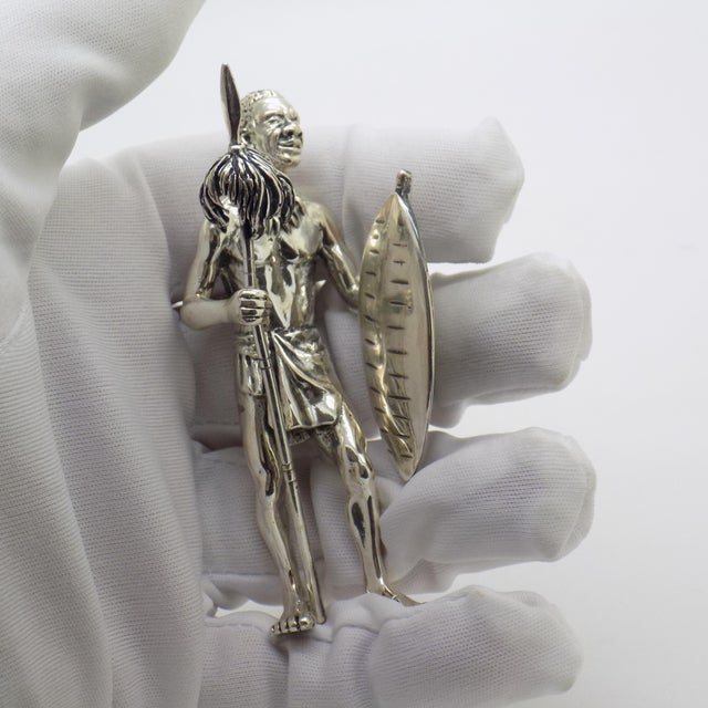 Large vintage solid silver figurine depicting an African Zulu warrior, crafted by the prestigious silversmith workshop...