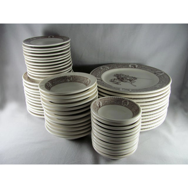 A phenomenal 1970s set of heavy restaurant ware. Cream/off white plates and bowls with brown graphics that are vibrant and...
