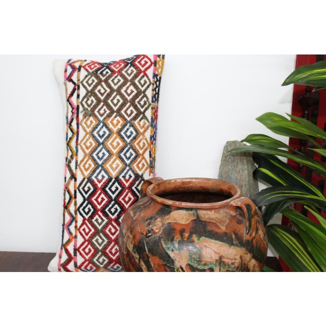 This Turkish pillow cover measures is made from the highest quality antique Kilim in 100% wool on the front. The back is...