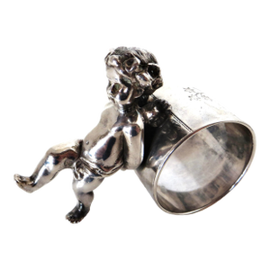 19thC Silver Plated Victorian Figural Napkin Ring; "Winged Cherub Pushing Ring"