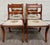 This is a beautiful antique full set of four Regency / Duncan Phyfe style dining chairs featuring elegant saber legs,...