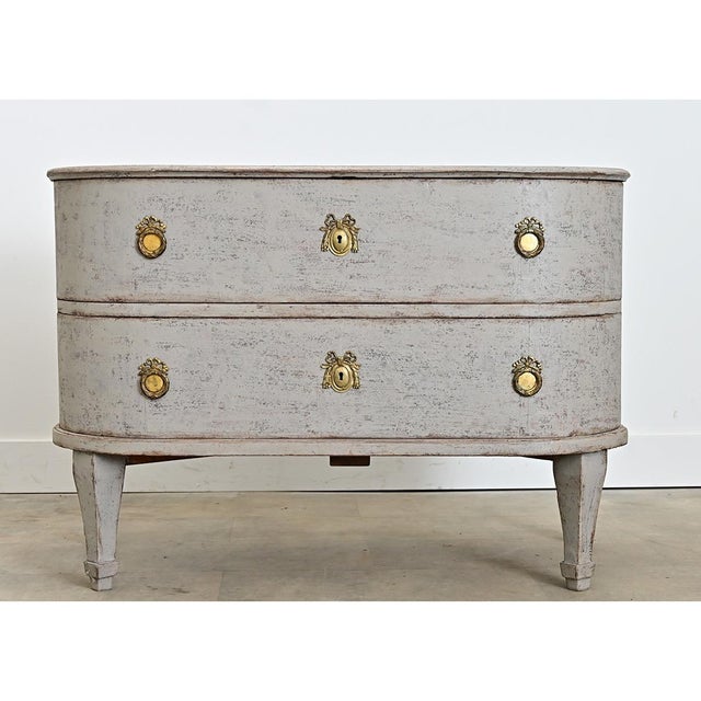 A very unusual Swedish Gustavian period painted demilune commode/chest of drawers from the late 18th century in charming...